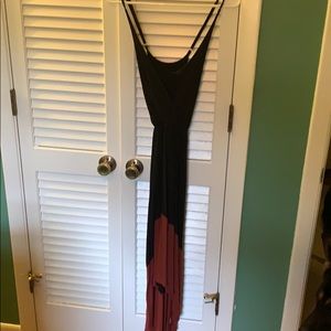 Asymmetrical black dress with maroon bottoms